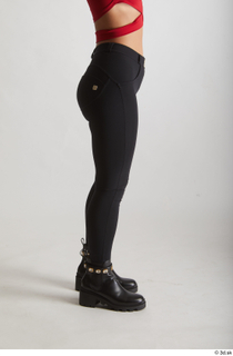  Zuzu Sweet  1 black boots black trousers casual dressed flexing leg side view 0011.jpg